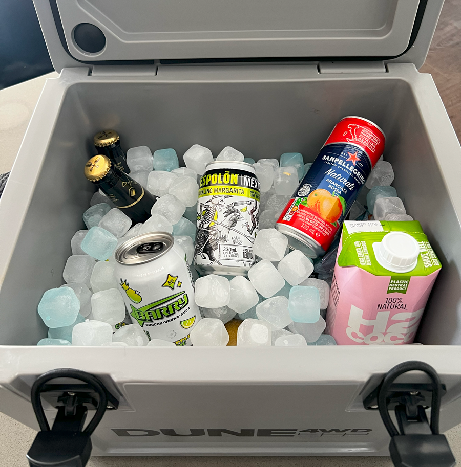 Cooler filled with Qubes reusable ice cubes keeping contents cold