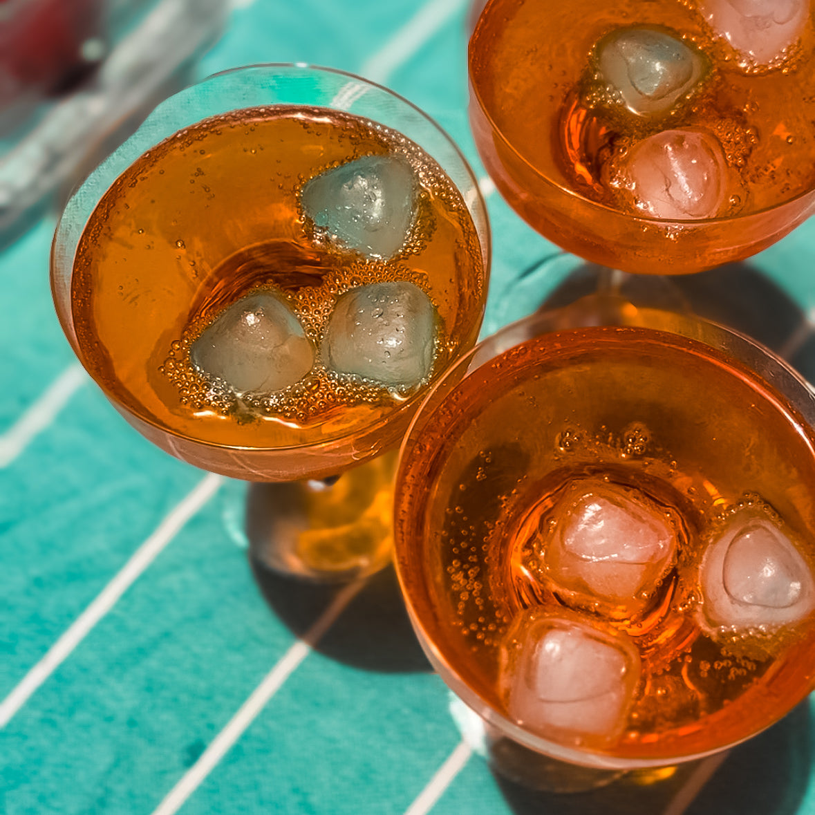 Cold drinks chilled with Qubes reusable ice cubes